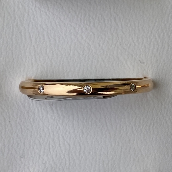 Glanzvoller Sammelring aus 585 Mittelgold mit neun Brillanten